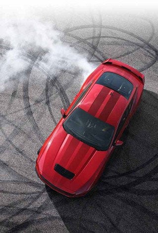 Overhead view of a 2024 Ford Mustang® model with tire tracks on pavement | Green Ford in Greensboro NC