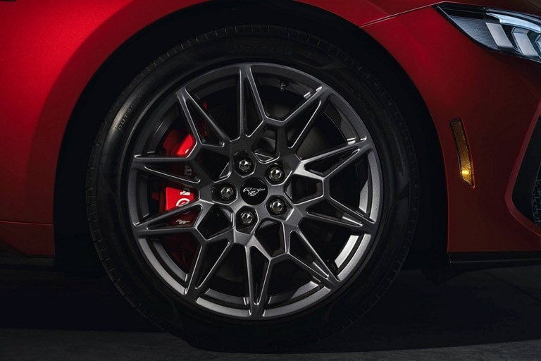 2024 Ford Mustang® model with a close-up of a wheel and brake caliper | Green Ford in Greensboro NC